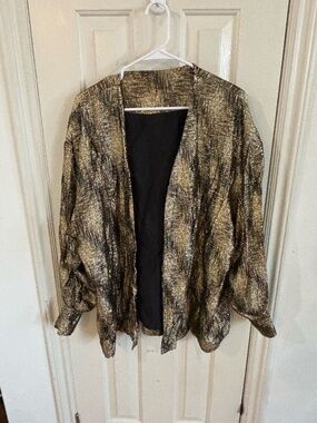 Vintage oversized gold and black sparkly jacket
